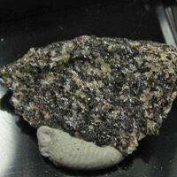 Ganomalite